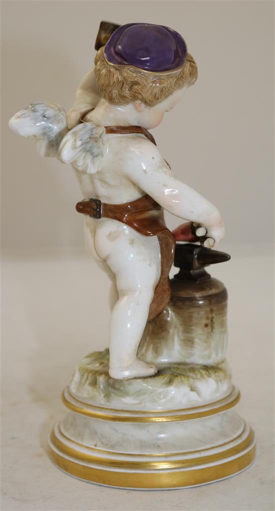 A Meissen porcelain figure of cupid depicted as a blacksmith forging a heart, 18.5cm